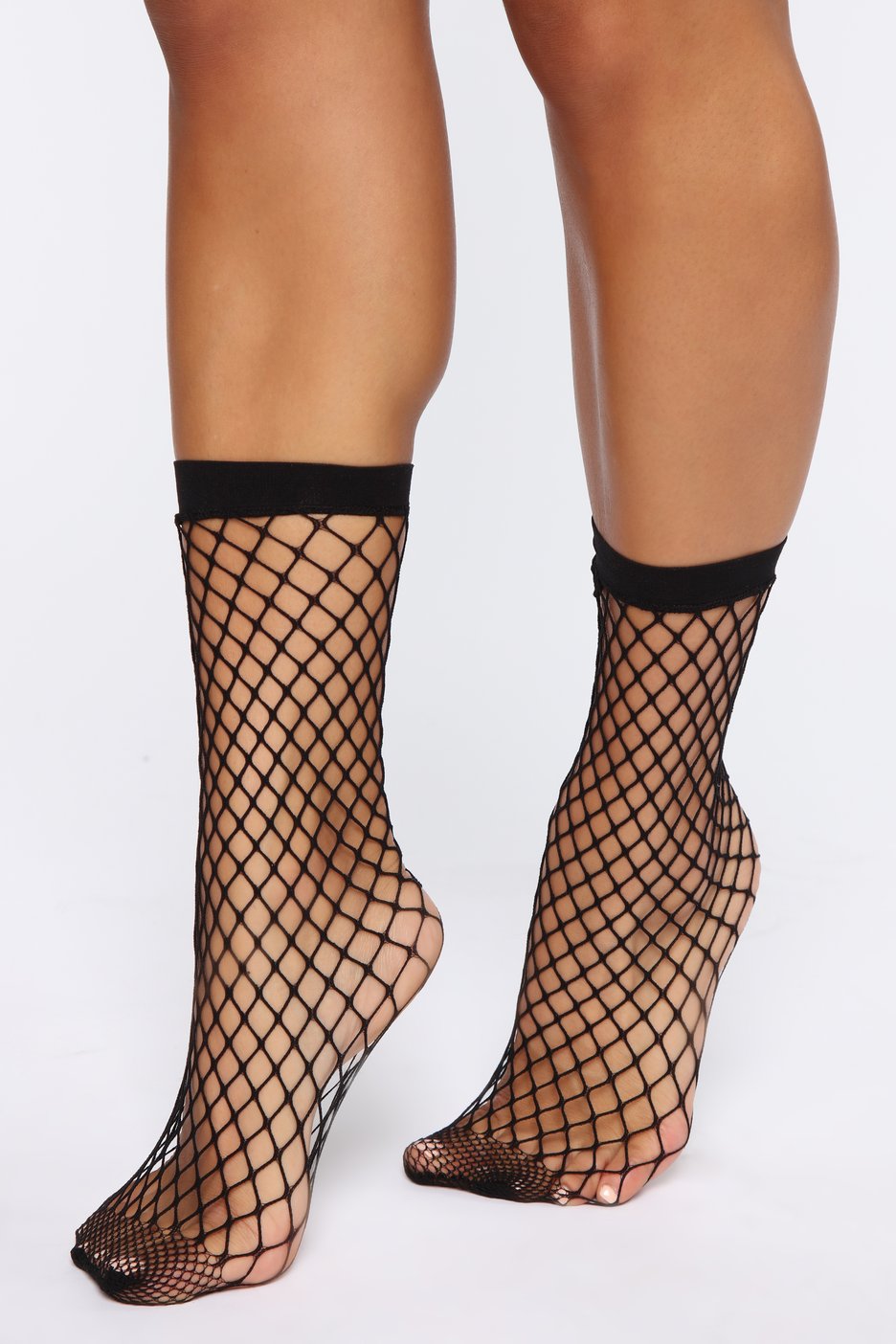 Wholesale fishnet socks To Compliment Any Outfit Or Be Discreet 